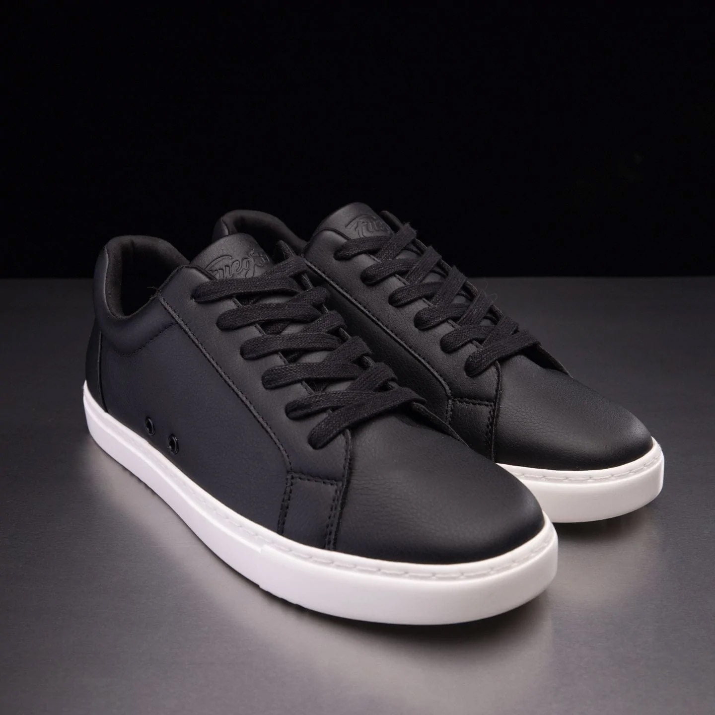 Black low cut jordans shop